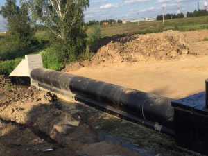 Сооружение водоперепускной трубы на ПК305+00